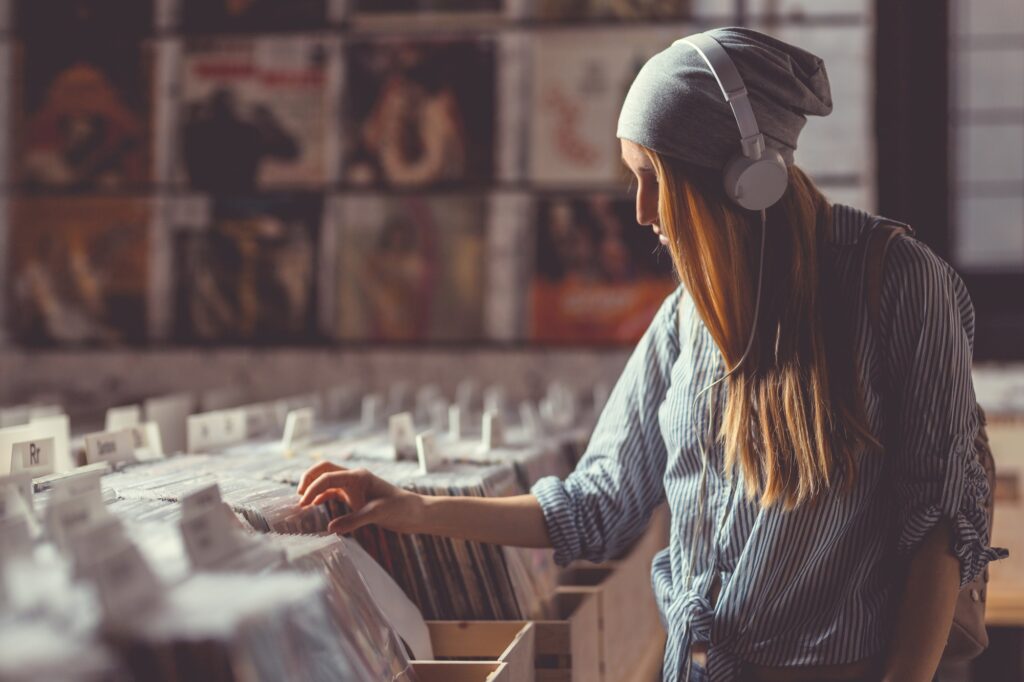 Young girl in a vinyl record store